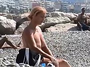 Hot milf gets bare at the beach and demonstrates off her unbelievable assets
